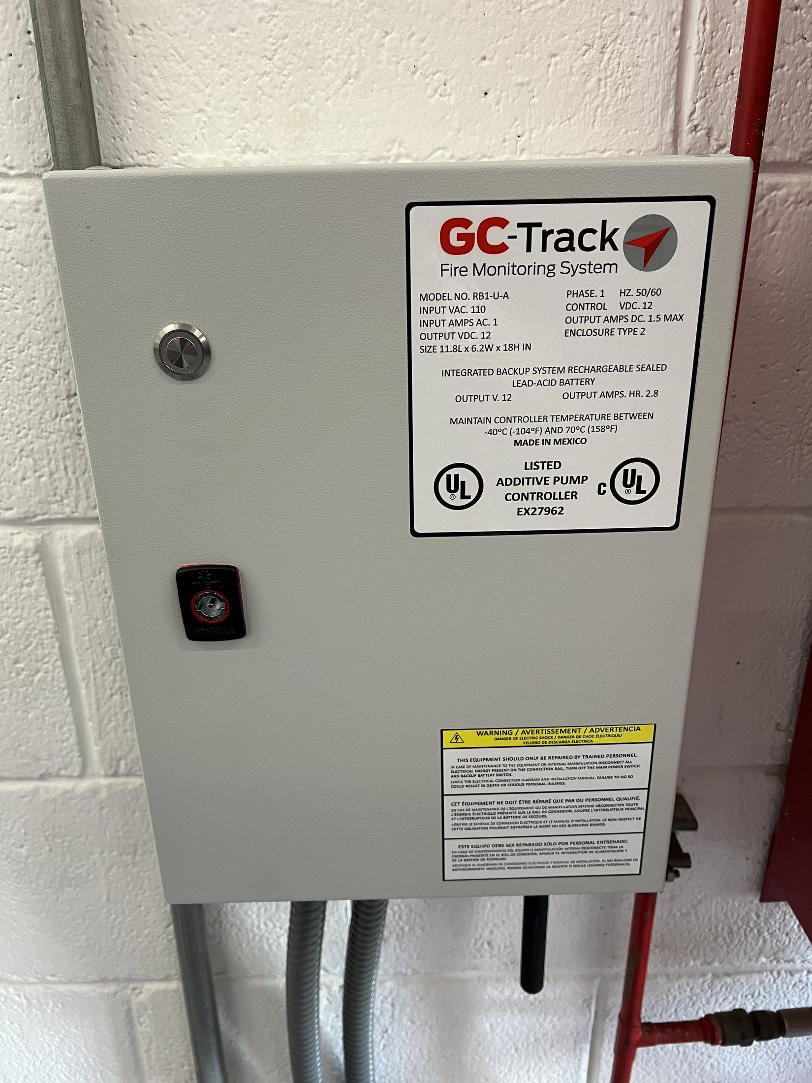 Nameplate of the GC-Track monitoring unit, with UL listing and a built-in backup battery.